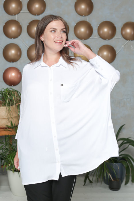 Рубашка DP 2014-9WH Рубашка выполнена из штапеля, манжеты и вставки по бокам - из мелкой трикотажной резинки.